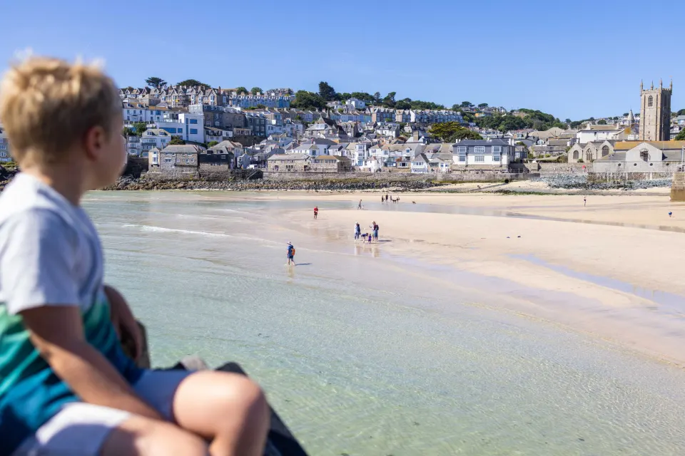 Image collections-coastal-escapes-1780304472 for Boy overlooking the beach in St Ives
