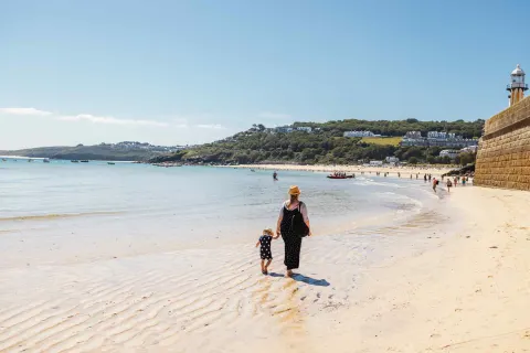 Image collections-family-homes-1780395088 for Mother and child walking on the beach in St Ives