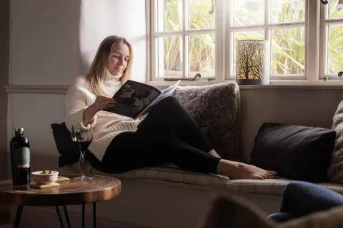 Image december-holidays-cornwall-1788346413 for Lady relaxing on a winter break