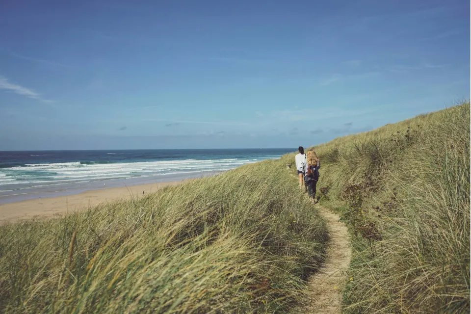Image locations-north-cornwall-perranporth-st-agnes-1778152471 for Couple walking from Perranporth