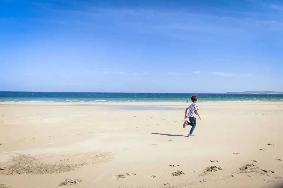 Image locations-west-cornwall-carbis-bay-1777454379 for Child running on Carbis Bay beach