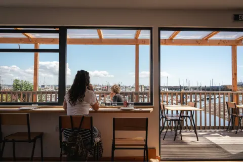 Image locations-west-cornwall-marazion-penzance-1777537625 for Lady enjoying a meal at Argoe, Newlyn