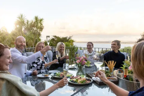 Image locations-west-cornwall-st-ives-1777388456 for Guests at a Cornish Gems property enjoying a glass of wine before dinner