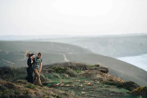 Image october-holidays-in-cornwall-1787843108 for Couple on the coast path in October
