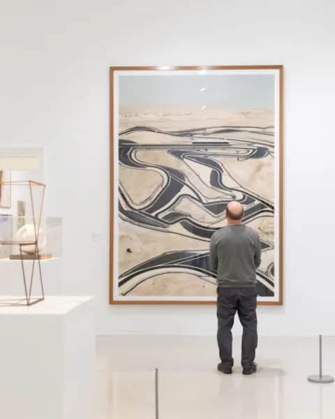 Image a-guide-to-loving-the-rain-in-cornwall-1789562259 for Man looking at art at The Tate St Ives