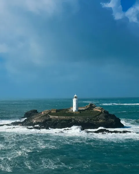 Image storm-watching-in-cornwall-1790087731 for Godrevy Lighthouse on the Cornish coast