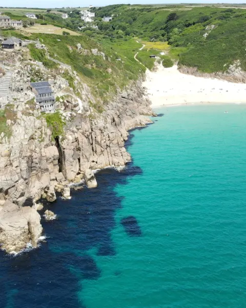 Image the-best-beaches-in-cornwall-for-every-kind-of-beach-day-1791555487 for Porthcurno Beach, West Cornwall