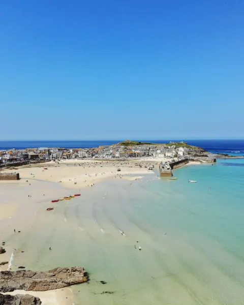 Image the-ultimate-guide-to-coastal-holidays-in-cornwall-1781004447 for A drone image of St Ives, Cornwall