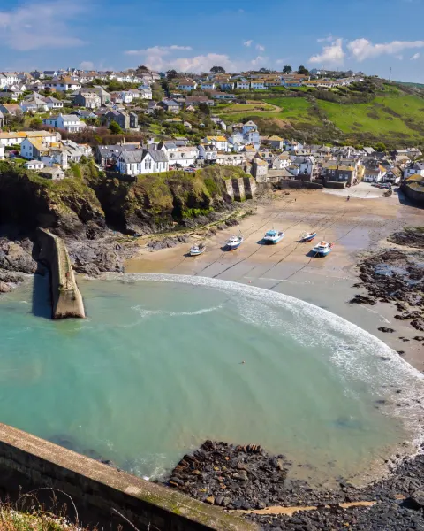 Image the-ultimate-guide-to-coastal-holidays-in-cornwall-1781004647 for A drone image of Port Isaac, Cornwall