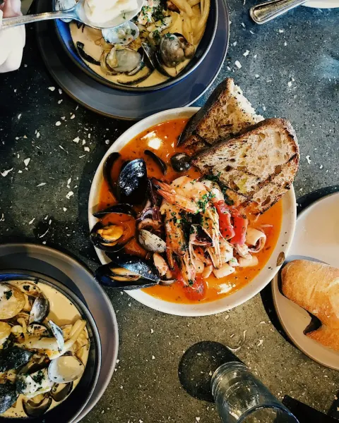 Image the-ultimate-guide-to-coastal-holidays-in-cornwall-1781005255 for An image of plated seafood in a restaurant