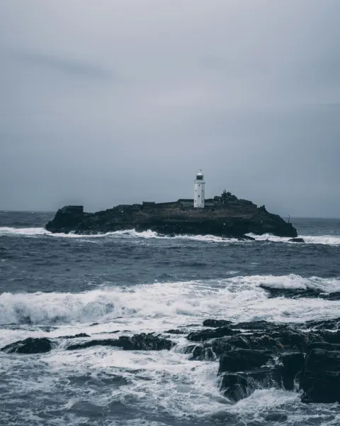 Image the-ultimate-guide-to-coastal-holidays-in-cornwall-1781005361 for An image of a storm at Godrevy Lighthouse, Gwithian, Cornwall