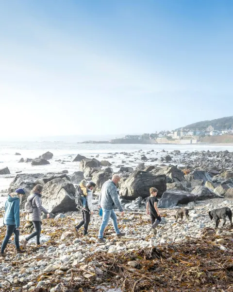 Image why-winter-is-cornwalls-best-kept-secret-1790693238 for Family walking along Marazion beach in winter
